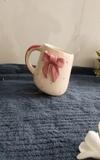 The Earthystone Cute Ribbon Design Ceramic Cup for Tea Coffee Milk Hot Drinks Decorative Pink Bow Printed Ceramic Mug for Home Office Desk Use Charming Gift Cup